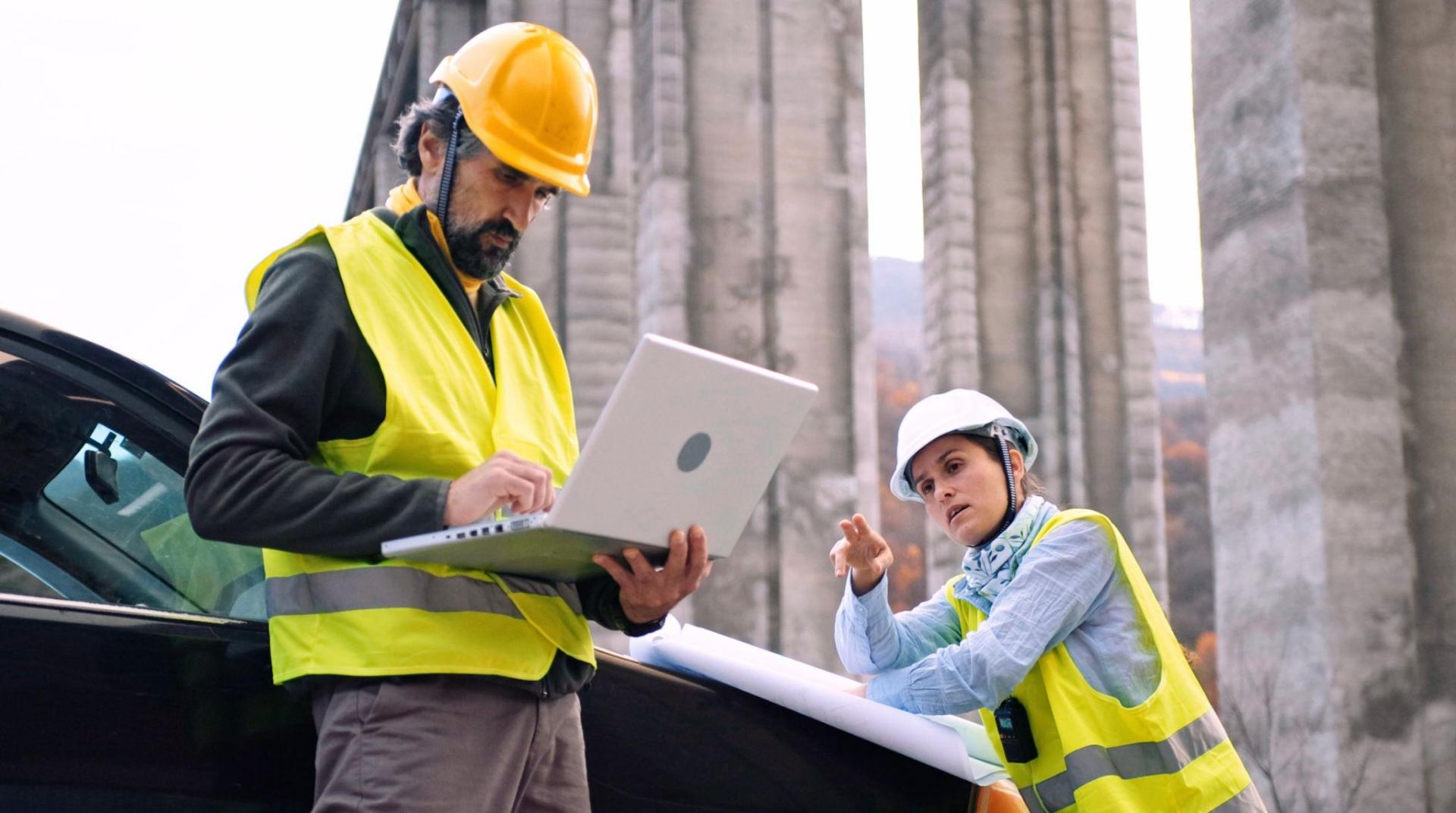 Foreman reviewing plans on a civil construction jobsite
